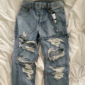 Carmar ripped jeans with leg strap